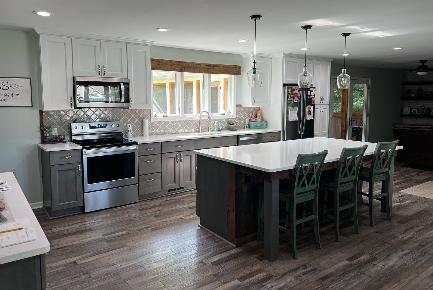 Renovated farmhouse kitchen with island seating
