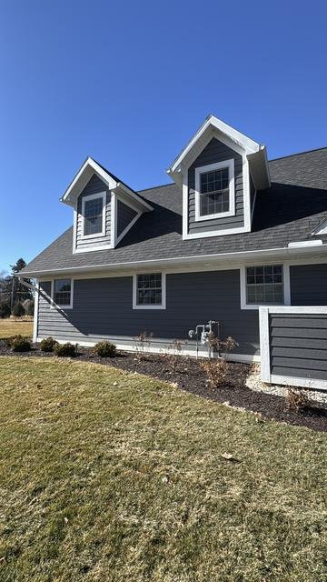 Delavan Full Exterior and Addition by Monien Construction, photo 3 of 24